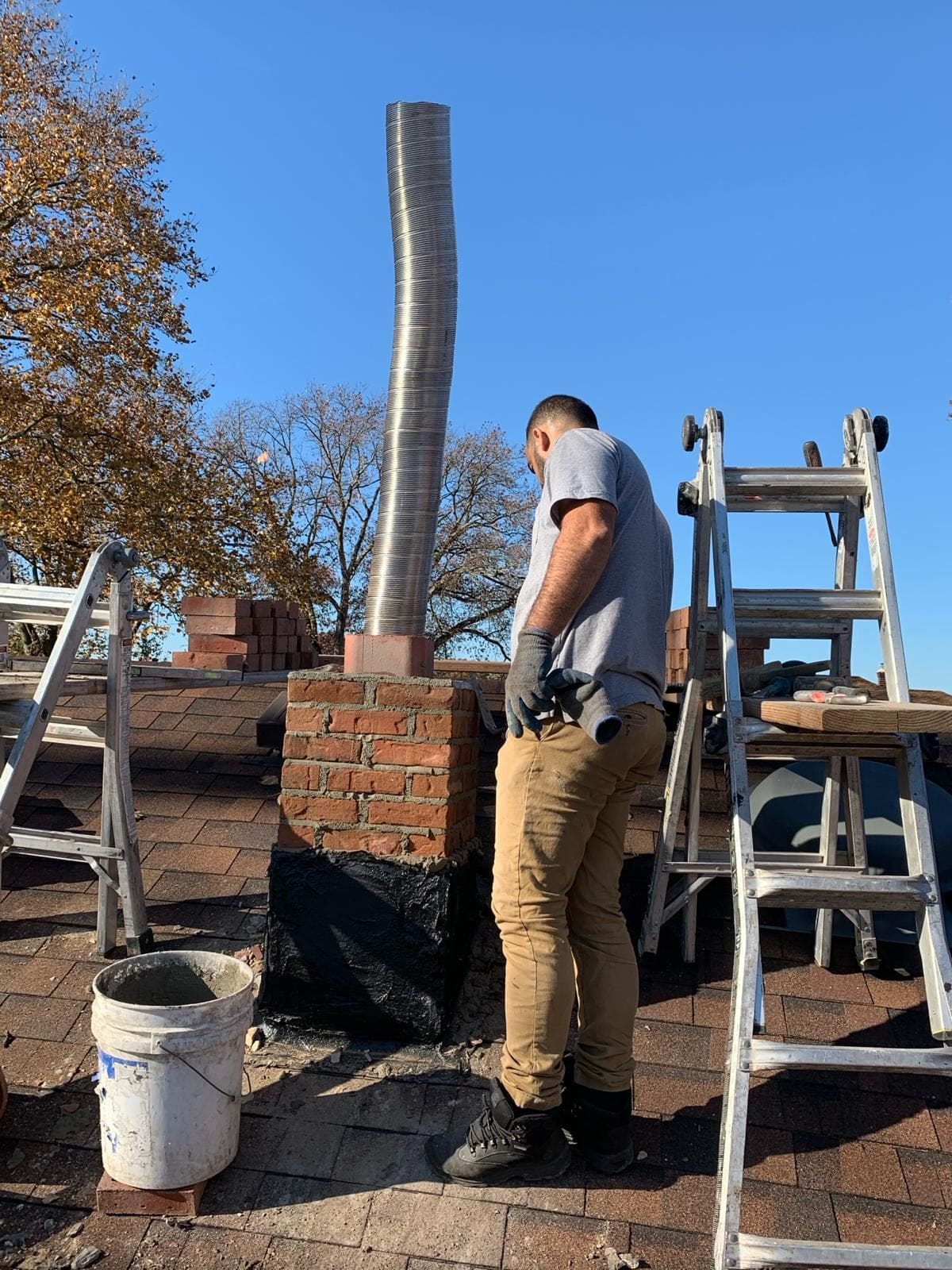 Stainless liner installed into a rebuilt brick chimney