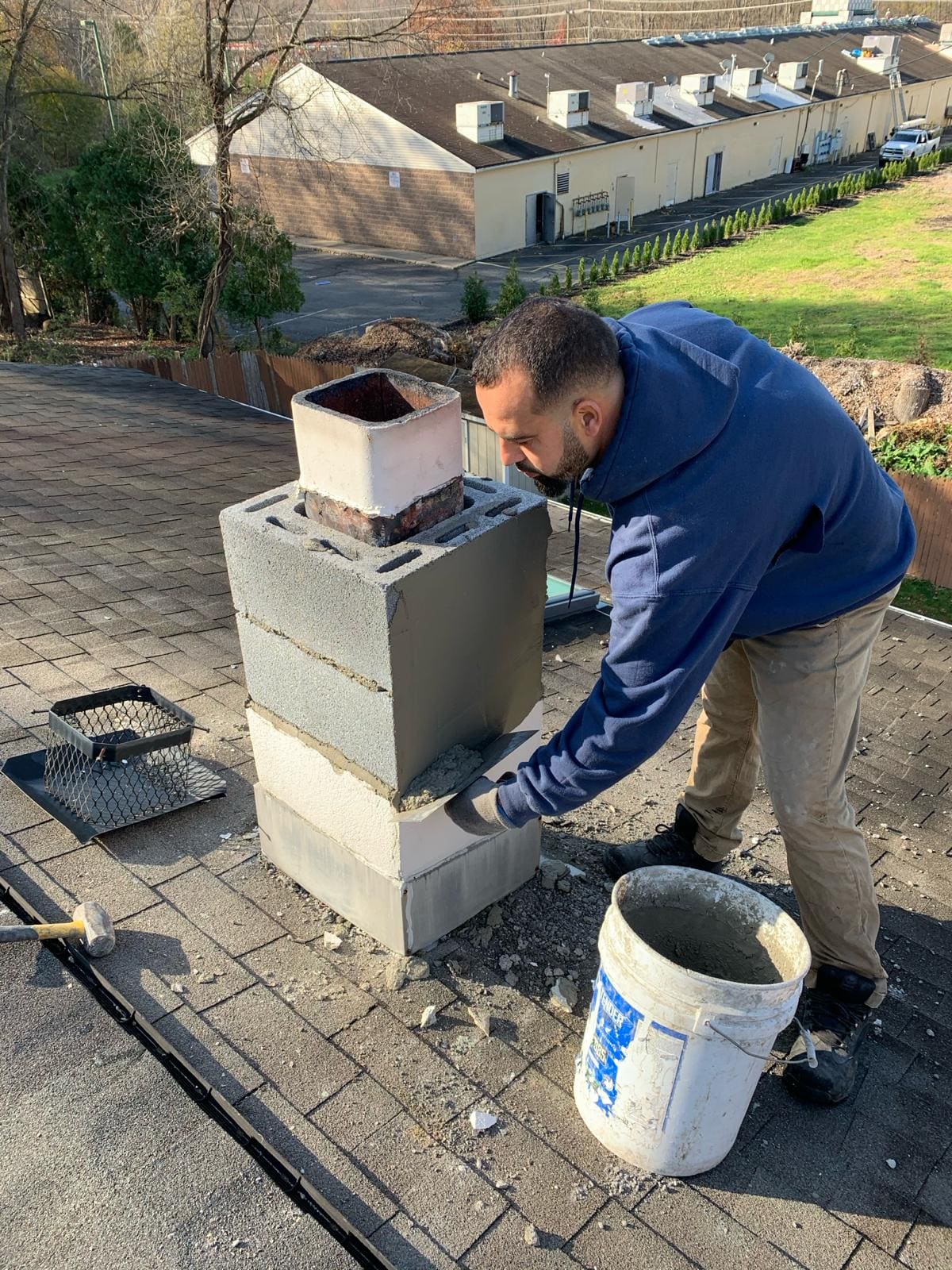 Rebuilt residential brick chimney by Asset Roofing & Chimney