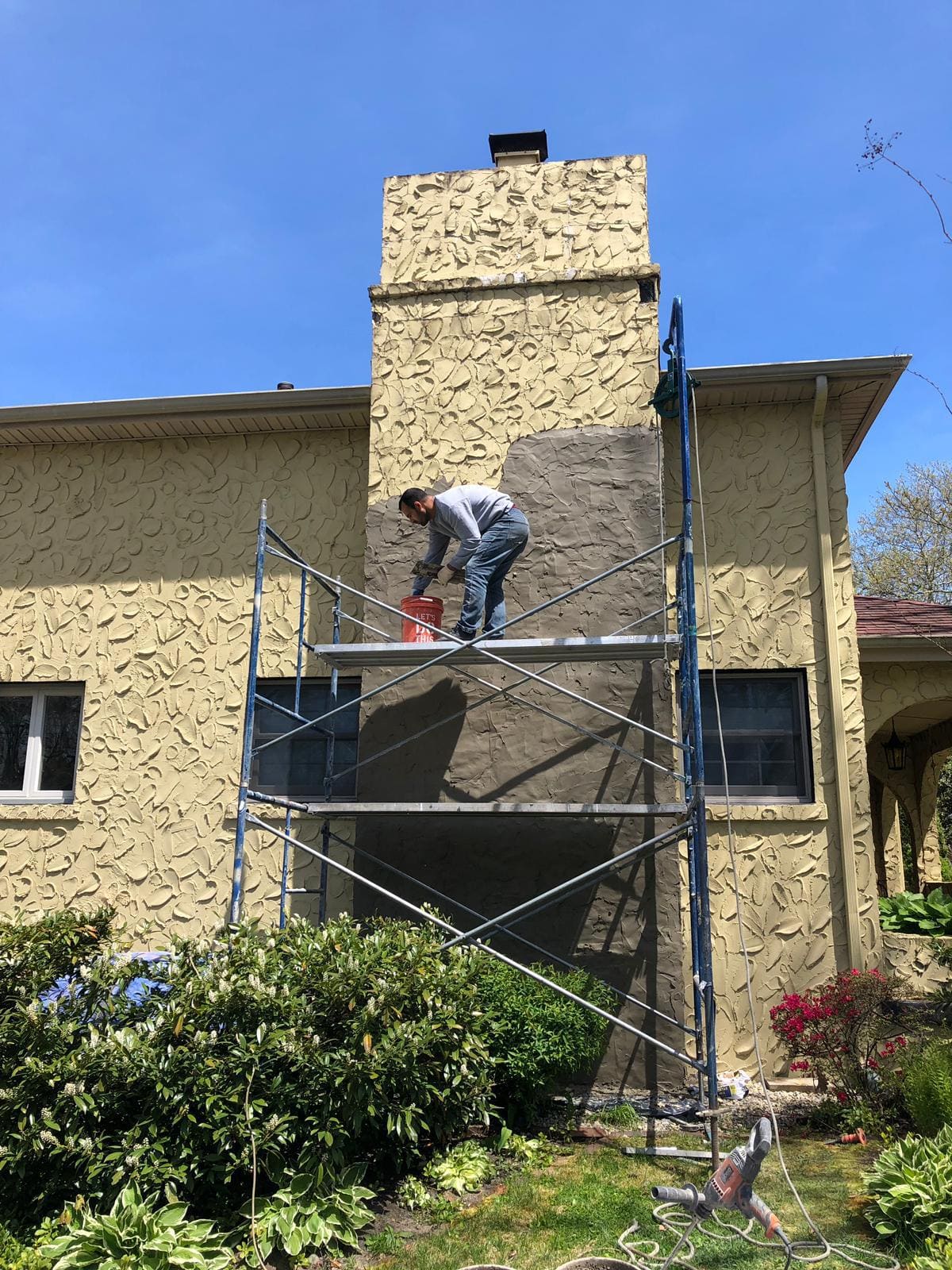 Stucco exterior and chimney work by Asset Roofing & Chimney on a New Jersey home