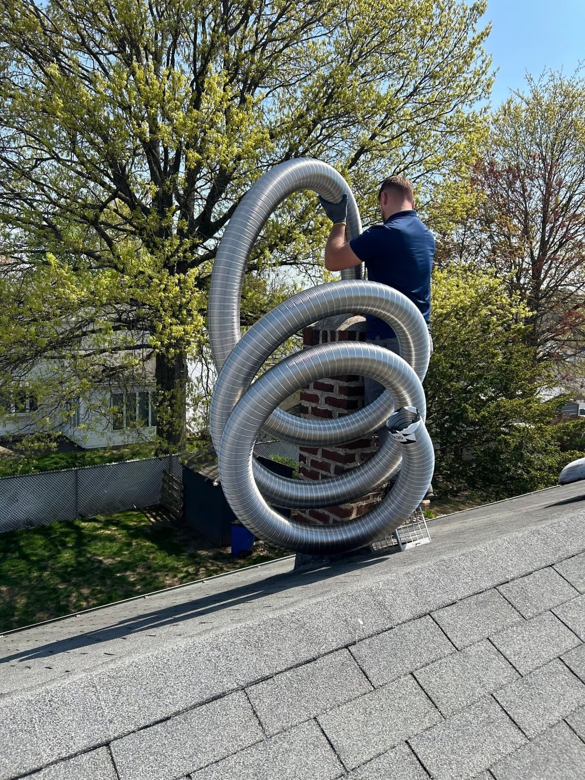 Coiled stainless steel chimney liner ready for installation